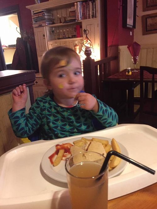 Have vegetarian toddler with her bean burger.  at Zoukinis in Bournemouth