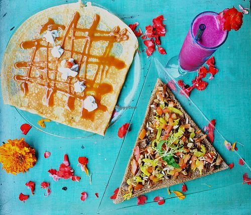 Vegan lunch set with one gluten free and vegan buckwheat galette, one vegan sweet crepe topped with homemade salted caramel and coconut whipped cream, served with a fresh juice at The Spell Creperie in Ubud