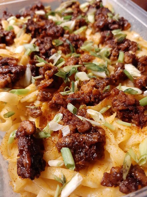 Salted 'egg' longganisa pasta at The Real Happy Cow in Metro Manila