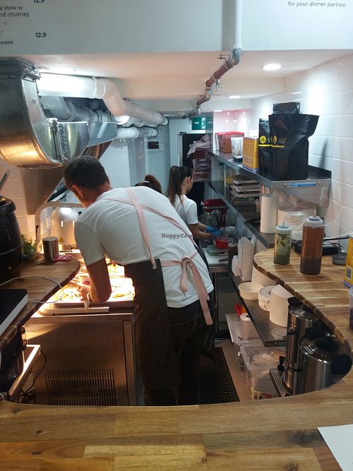 Busy kitchen at Flyover Fritterie & Chai Bar in Redfern