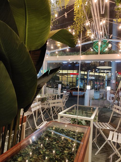 Indoor and outdoor stylish seating area at Sweet Balance - Yeoksam in Seoul