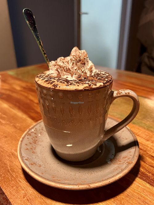 Hot Frappe with whipped cream   at Bio Cafe in Aberdeen