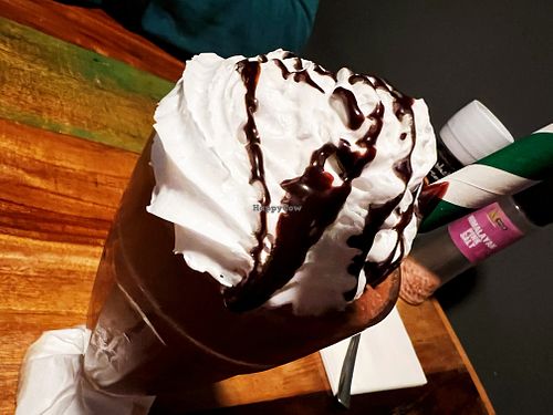 Frappe with vegan whipped cream   at Bio Cafe in Aberdeen
