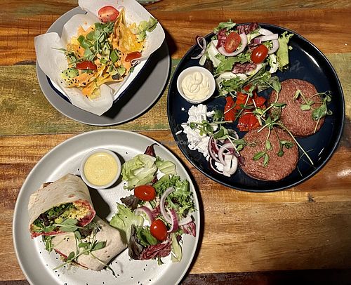 The God father burgers (no bun), tofu wrap, and nachos   at Bio Cafe in Aberdeen