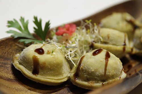 sorrentinos fritos con salsa de hongos at Namaste in Montevideo