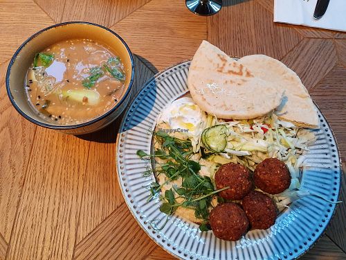 Gazpacho soup and falafel plate at Veganutye in Moscow