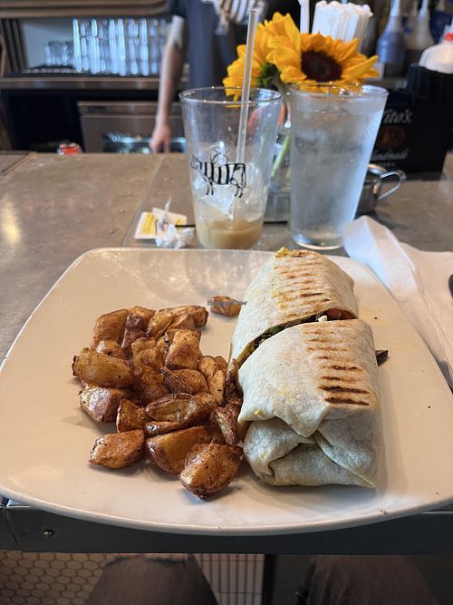 Breakfast Burrito with potatoes  at Milk & Honey in Chattanooga