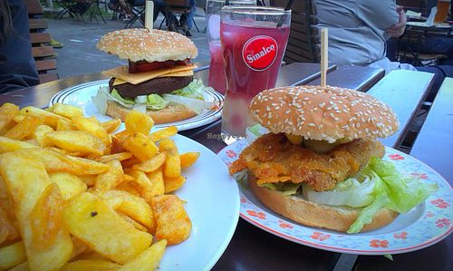 Burgers and big plate full of fries at Trash Chic in Cologne