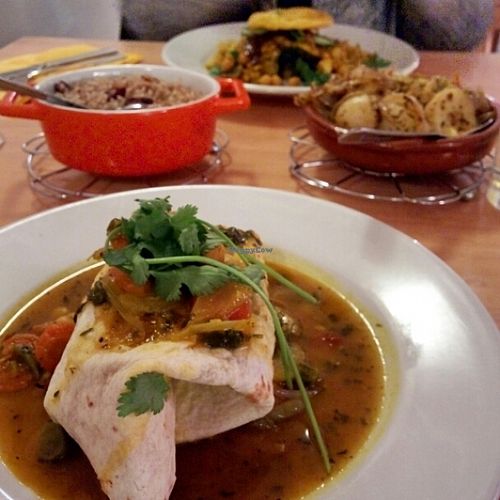 Vegetable roti, rice and beans, potatoes, trini doubles at Marinades in Cheltenham