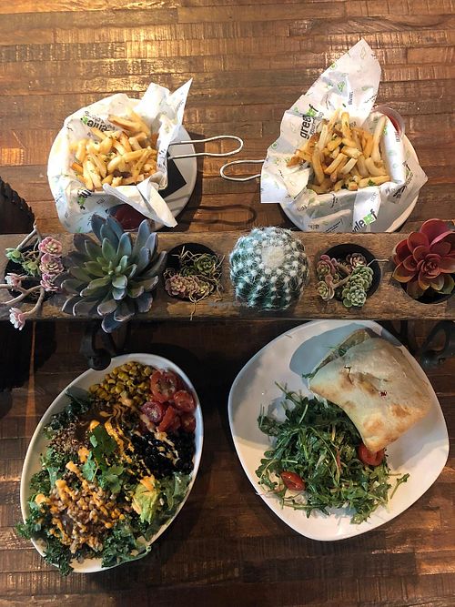 Salad and burger with garlic chips  at Greenleaf Gourmet Chop Shop in Hollywood