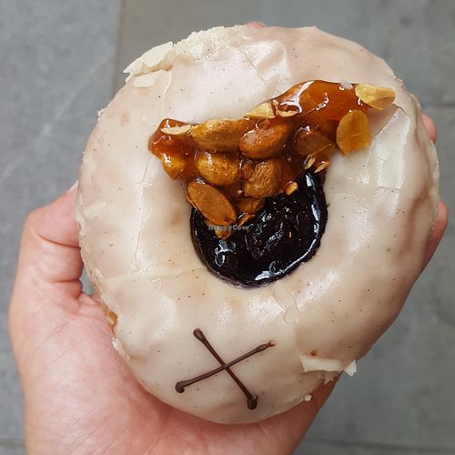 Vegan blueberry doughnut with peanut brittle at Crosstown Doughnuts - Cannon St in London