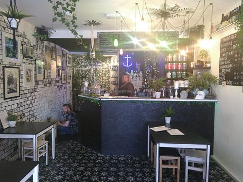 Dan updating the wall candy.
Zuzana behind the well stocked bar.  at Deptford Does Art in South East London