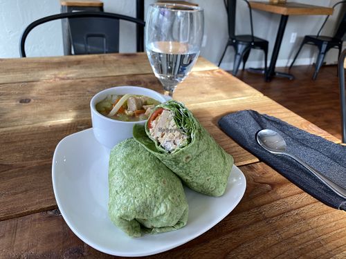 ITALIAN COUNTRYSIDE-Shredded Soy chicken with fresh rosemary, garlic, red onion, lemon and vegan mayo over a bed of spinach and tomatoes on choice of bread or wrap at EARTH in Twain Harte