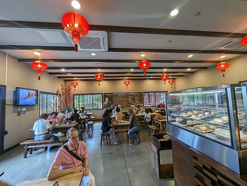 Dining area at Water Drop Vege Cafe at Fo Guang Shan Temple in Auckland