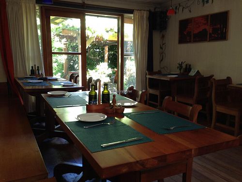the restaurant with garden at Ecole in Pucon