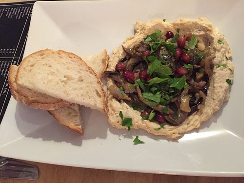 Middle eastern eggplant, pomegranate and hummus with soudough (vegan) at Vas Manci in Budapest