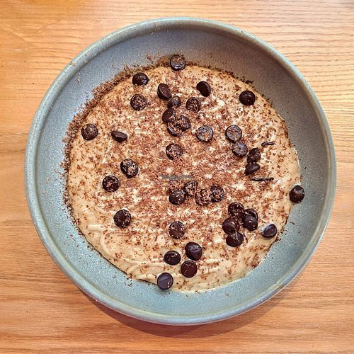 Porridge with oat milk, tahini drizzle, smoked salt and chocolate. Heaven at Epicures in Glasgow
