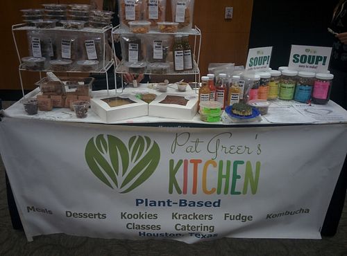 Pat Greer's Kitchen market display. Kombucha, bean mixes, raw crackers, chips, & dips, raw & cooked desserts. All deliciously vegan of course! at Pat Greer's Kitchen in Houston