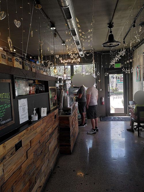 cafe area at Oakland Coffee & Juice Bar in Oakland Park