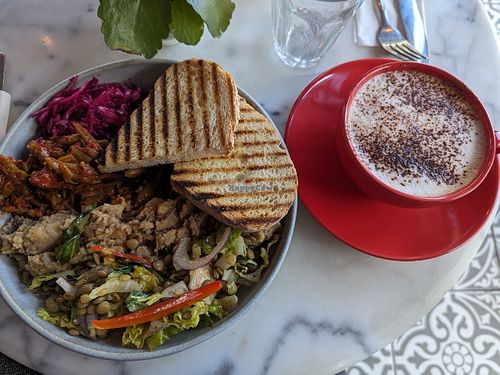 Salad plate and oatmilk cappuccino at Parlé Pantry in West London