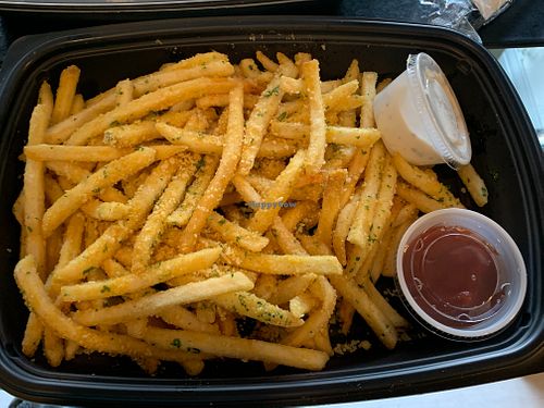 Vegan truffle parmesan fries with ketchup at CRAVE in Sioux Falls