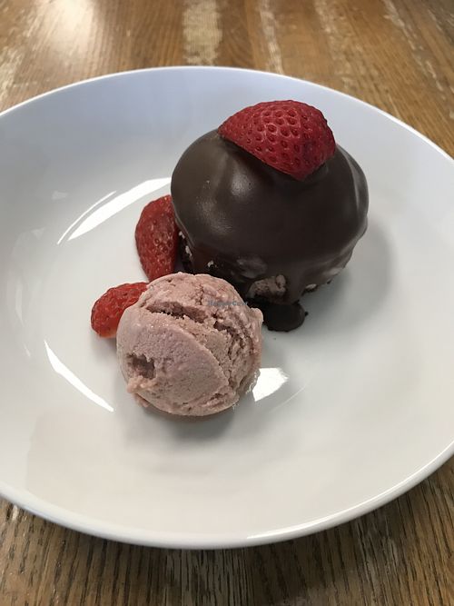Chocolate cake with strawberry mousse and strawberry ice cream.  at Foodhisattva in Cleveland Heights