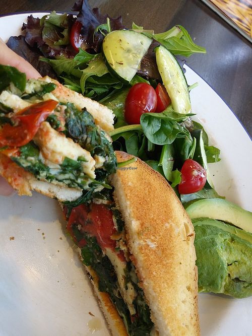Egg sandwich with "Paleo" style eggs: spinach, tomato and avocado. On gluten free bread. at Grown in Middletown