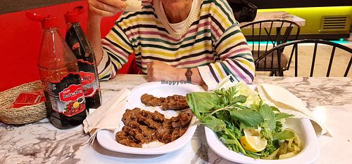 So good, it's already half eaten. Don't forget the pomegranate sauce! at Battalbey Cig Kofte in Karahayit