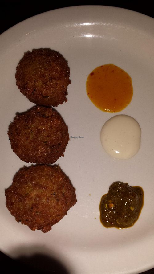 Falafel balls with sauces at Dvash in Boca Raton