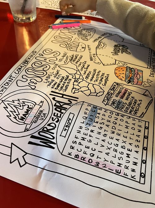 So fun! Kids coloring papers.   at Mosa's Joint in Guam