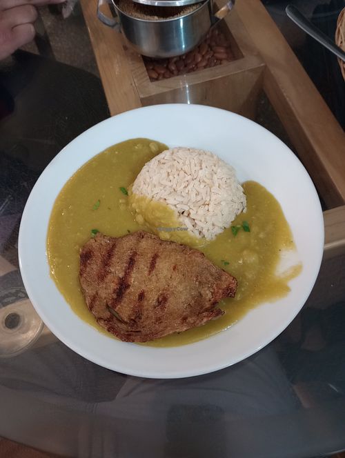 "Pure de arbeja verde con gluten a la parilla."
Gluten steak with pea puree. 
 at El Olivo in Cusco