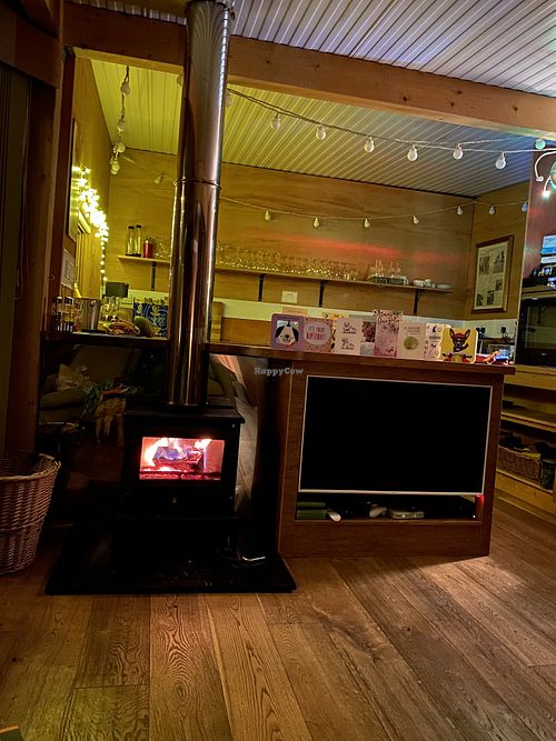 log burner cosy cabin area at The Base Vegan Retreat & Small Animal Sanctuary in Bristol