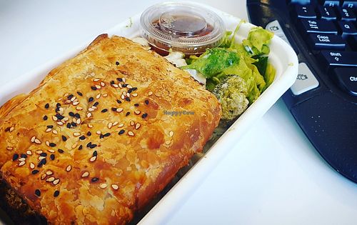 Takeaway sausage roll with salad at Home Vegan Bar in Docklands