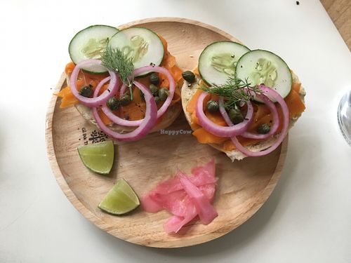 Carrot lox bagel with capers, cream cheeze, pickled onions and fresh dill.  at Jungle House in Da Nang