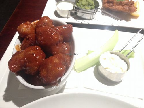 Cauliflower bites. Not bad, but too much spicy sauce overpowers the flavour & texture. at Abbey Tavern in Howth