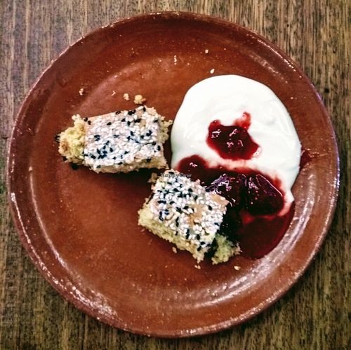 Tahini and salted almond cake with yoghurt and strawberries at Morito in East London