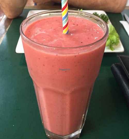Mango, pineapple, papaya, dragonfruit and coconut cream smoothie! SO TASTY!  at Snoogies Health Bar in Cairns