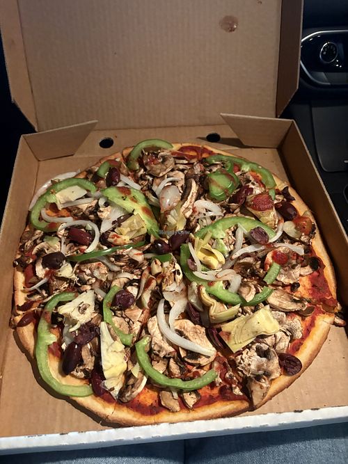 Vegetarian pizza without cheese and added artichoke - gluten free base available  at Rossini's Pizzaria in Mount Waverley