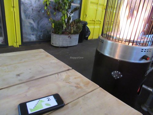 waiting by the heater at Herbivorous in Sheffield