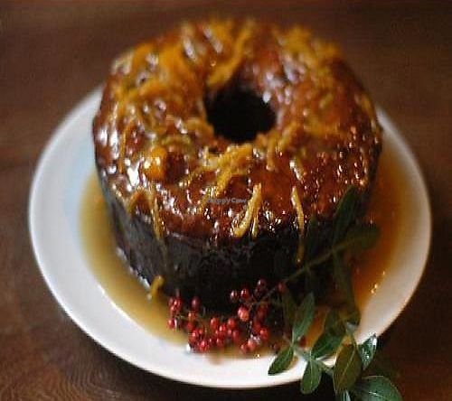 This cake is really special. It was made with tangerines and pink pepper freshly picked on the day from street gardens of Porto Alegre.  at Bonobo in Porto Alegre