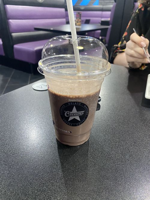 Half drank raspberry chocolate milkshake   at Creams Cafe in Middlesbrough