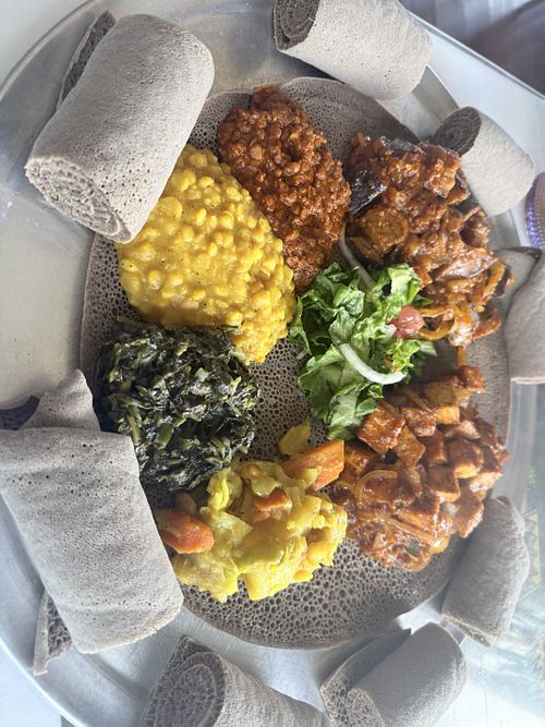 Combo dish plus added tofu tibs and eggplant   at Addis in Oakland