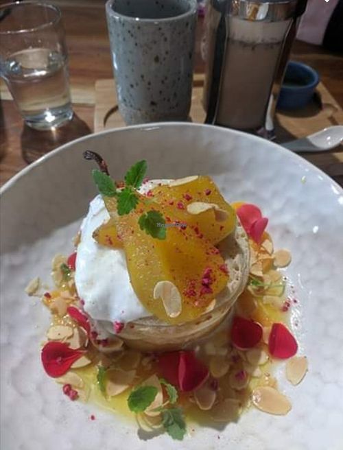 Crumpets with poached pear and mandarin. Amazingly delicious! at Good Food Emporium Cafe - Illume in Narre Warren