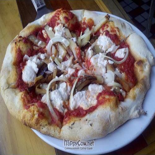 Same exact pizza I had last time - marinara, garlic, onions, french fries, and vegan cheese -- YUM!!! at Transfer Pizzeria in Milwaukee