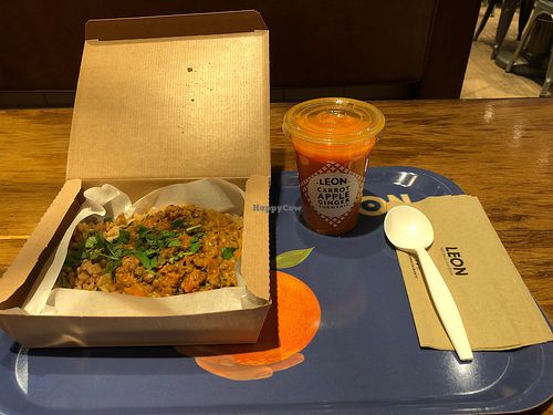 Lentil Masala and carrot-apple-ginger juice  at LEON in South West London