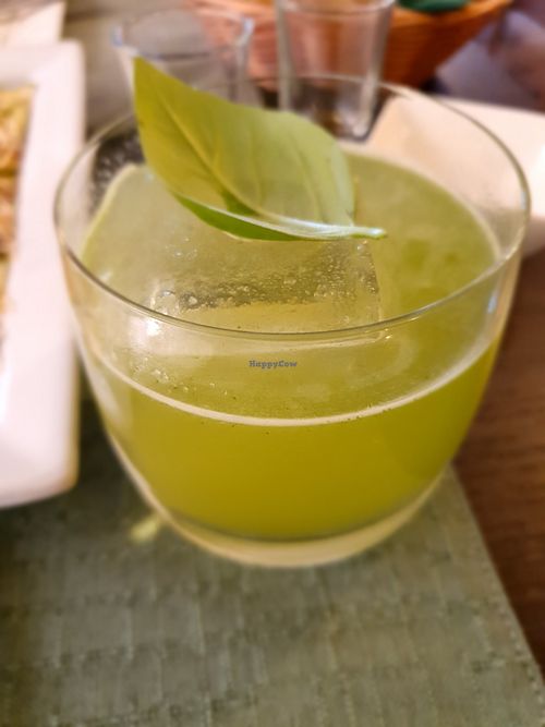 Cocktail with basil, lemon juice, gin, sugar at Dalmatino in Hvar