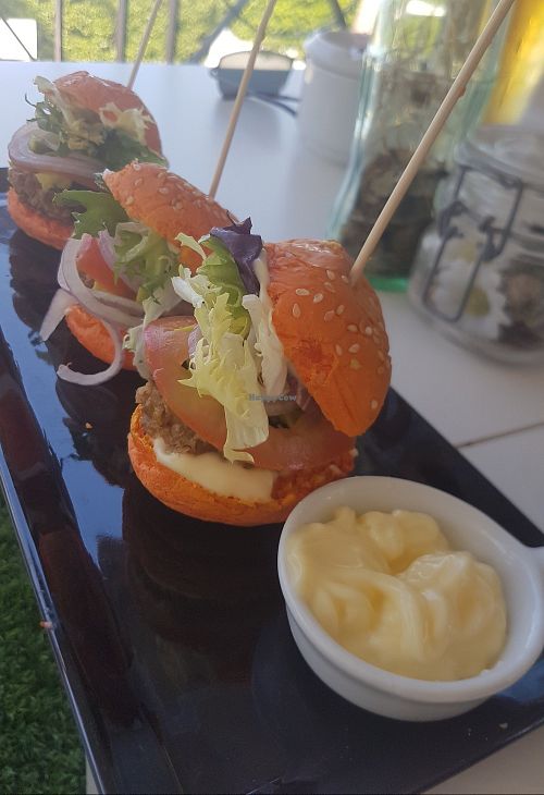 3 mini vegan burgers made of beans and vegetables. They were Amazing! at Wanderlust Garden in Mallorca