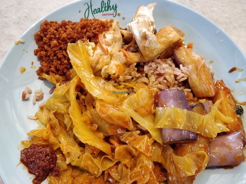 Tofu, Brinjal, Curry vegetables with brown rice at Vegetarian Stall - Lau Pa Sat in Central Singapore