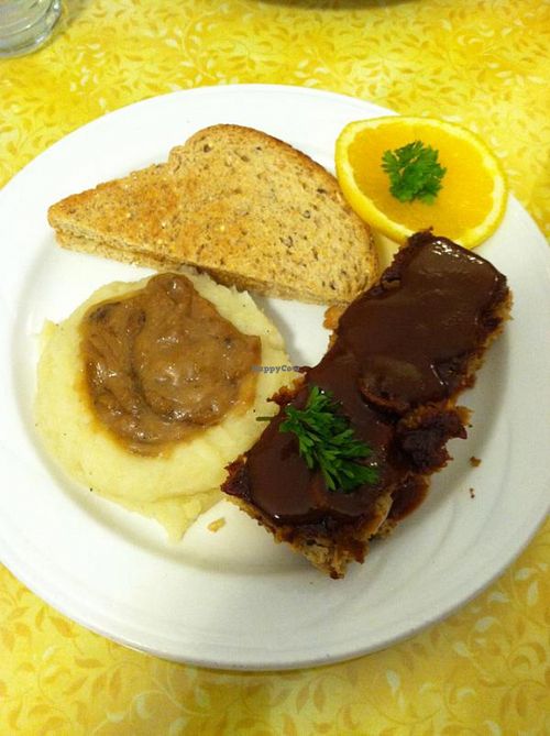 Mashed potatoes and gravy, meatloaf, and toast at Jyoti-Bihanga in San Diego
