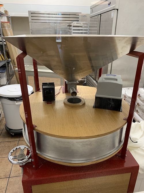 Milling grain  at The Bagel Mill in Petaluma